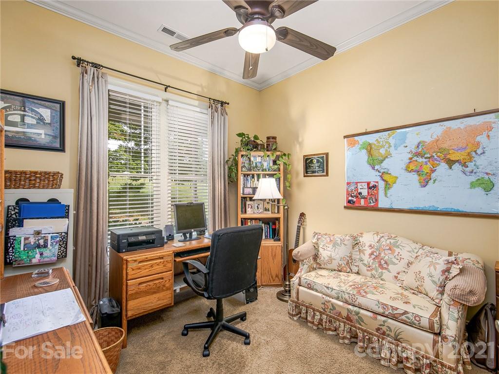 3043 John Watson Road Rutherfordton, NC 28139 - Photo 17 of 48 a living room with furniture and a large window with wooden floor