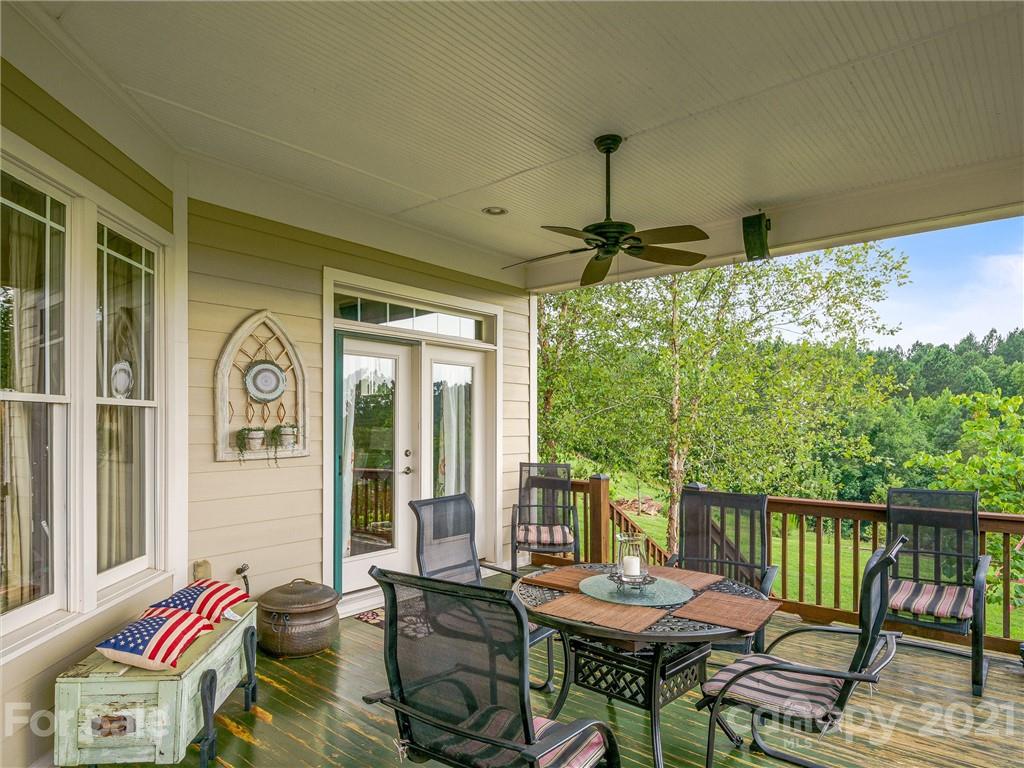 3043 John Watson Road Rutherfordton, NC 28139 - Photo 20 of 48 a balcony with furniture and a large window