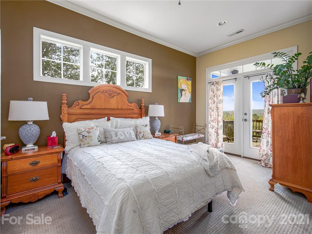 3043 John Watson Road Rutherfordton, NC 28139 - Photo 23 of 48 a bedroom with bed and wooden floor