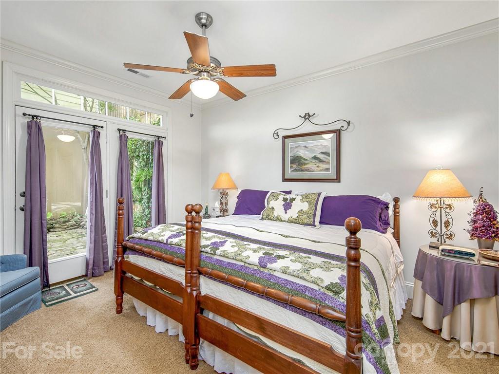 3043 John Watson Road Rutherfordton, NC 28139 - Photo 27 of 48 a bedroom with a bed and wooden floor