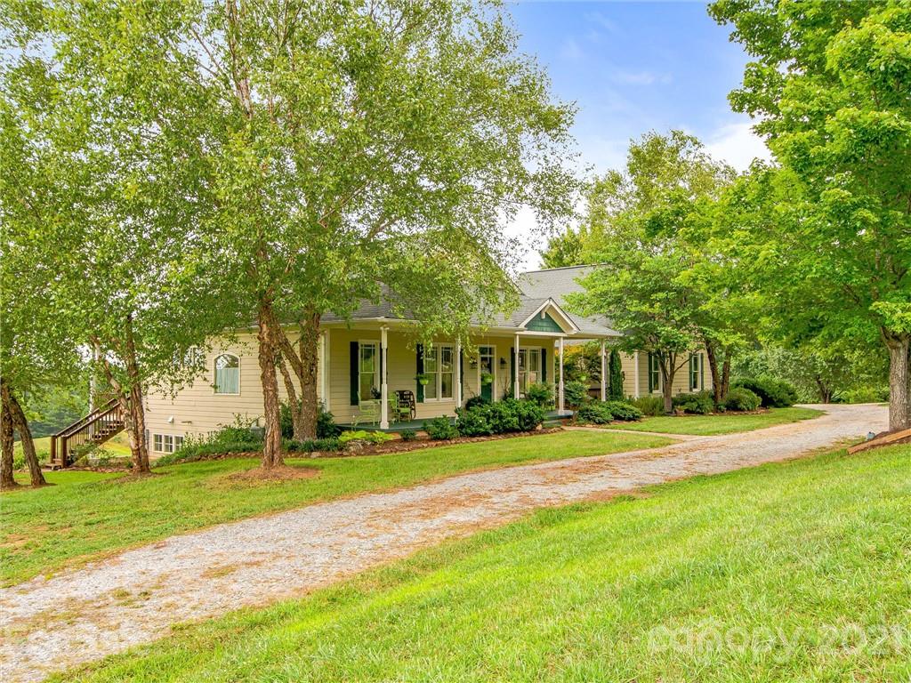 3043 John Watson Road Rutherfordton, NC 28139 - Photo 7 of 48 a front view of a house with a yard