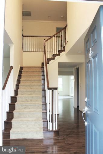 13773 Night Sky Drive Silver Spring, MD 20906 - Photo 14 of 20 a view of entryway and hall with wooden floor
