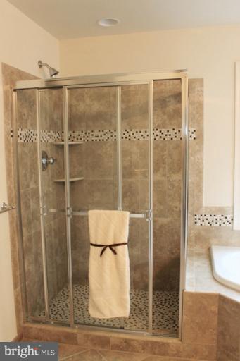 13773 Night Sky Drive Silver Spring, MD 20906 - Photo 19 of 20 a bathroom with a shower