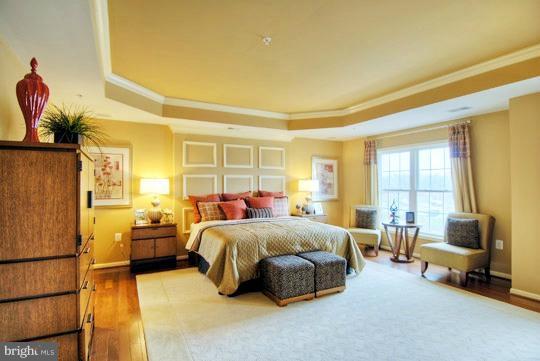 13773 Night Sky Drive Silver Spring, MD 20906 - Photo 5 of 20 a bed room with a bed and a couch