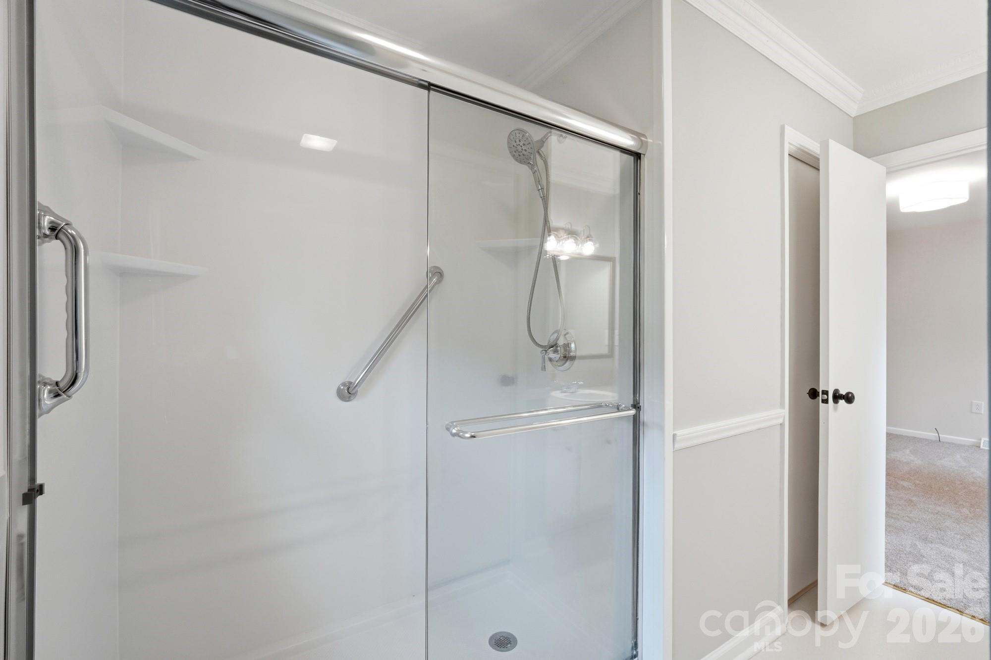1235 Winecoff School Road Concord, NC 28027 - Photo 15 of 27 a bathroom with a shower and a sink