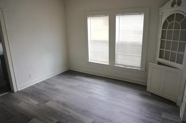 an empty room with windows
