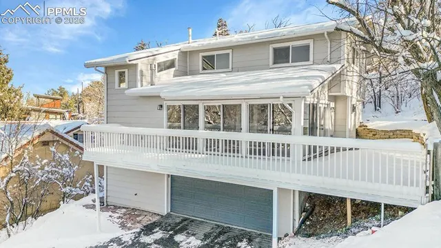 a front view of a house with a balcony