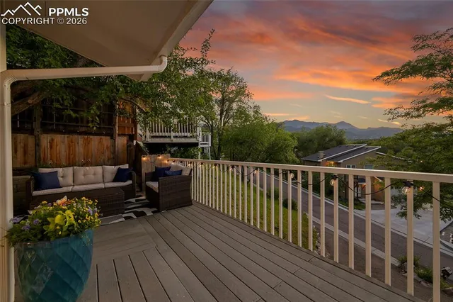 a view of balcony with furniture