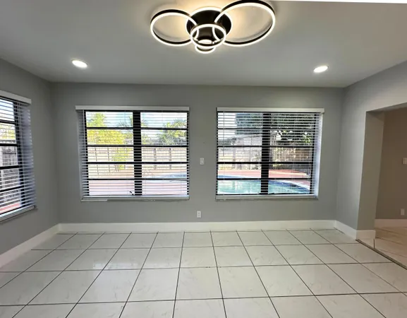 a view of an empty room and window