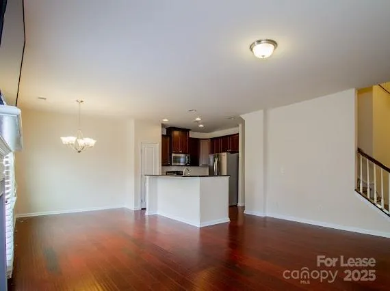 a view of livingroom with hardwood floor and window