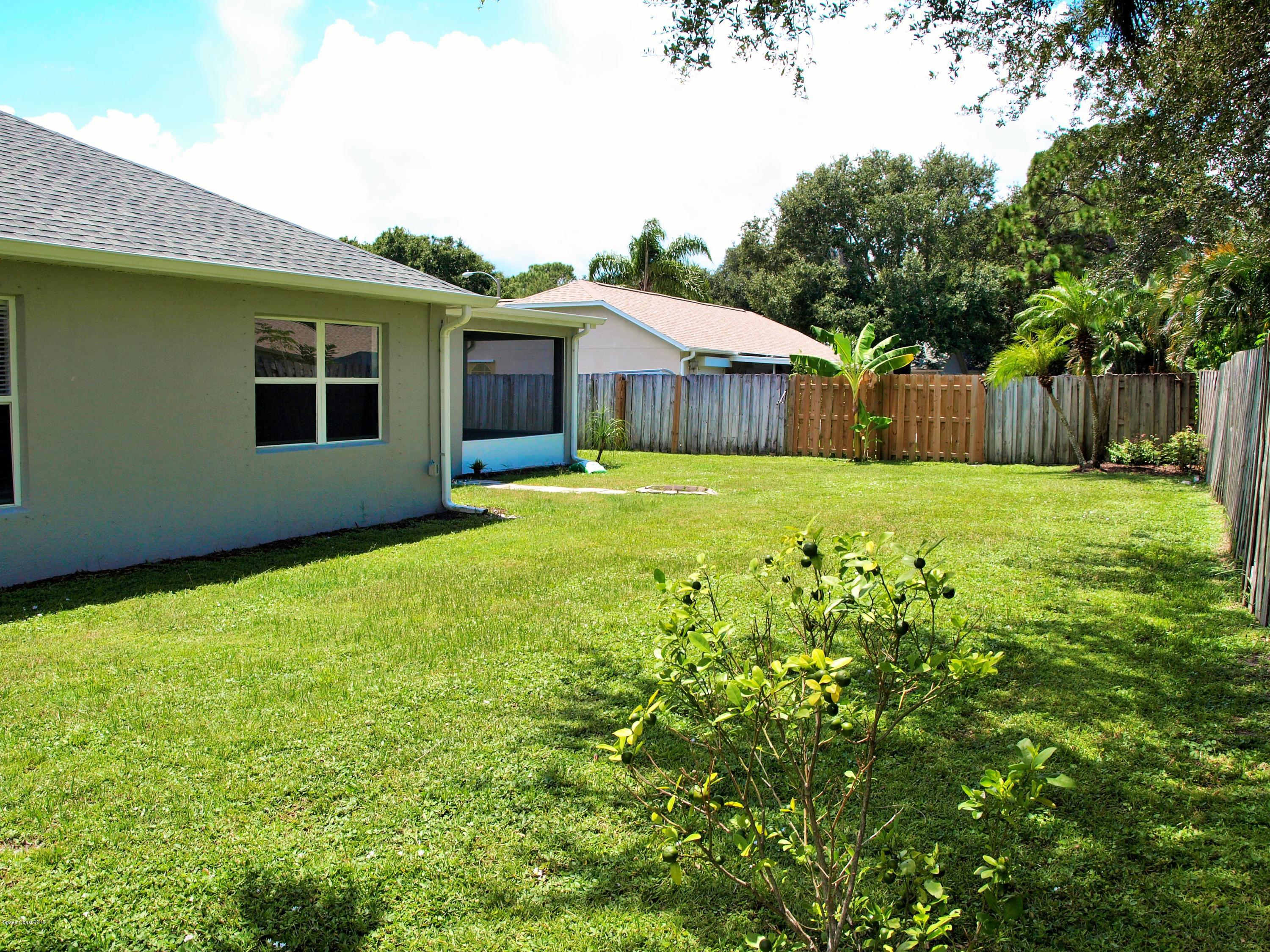 218 Twin Lakes Road Melbourne, FL 32901 - Photo 31 of 32 Back of Home