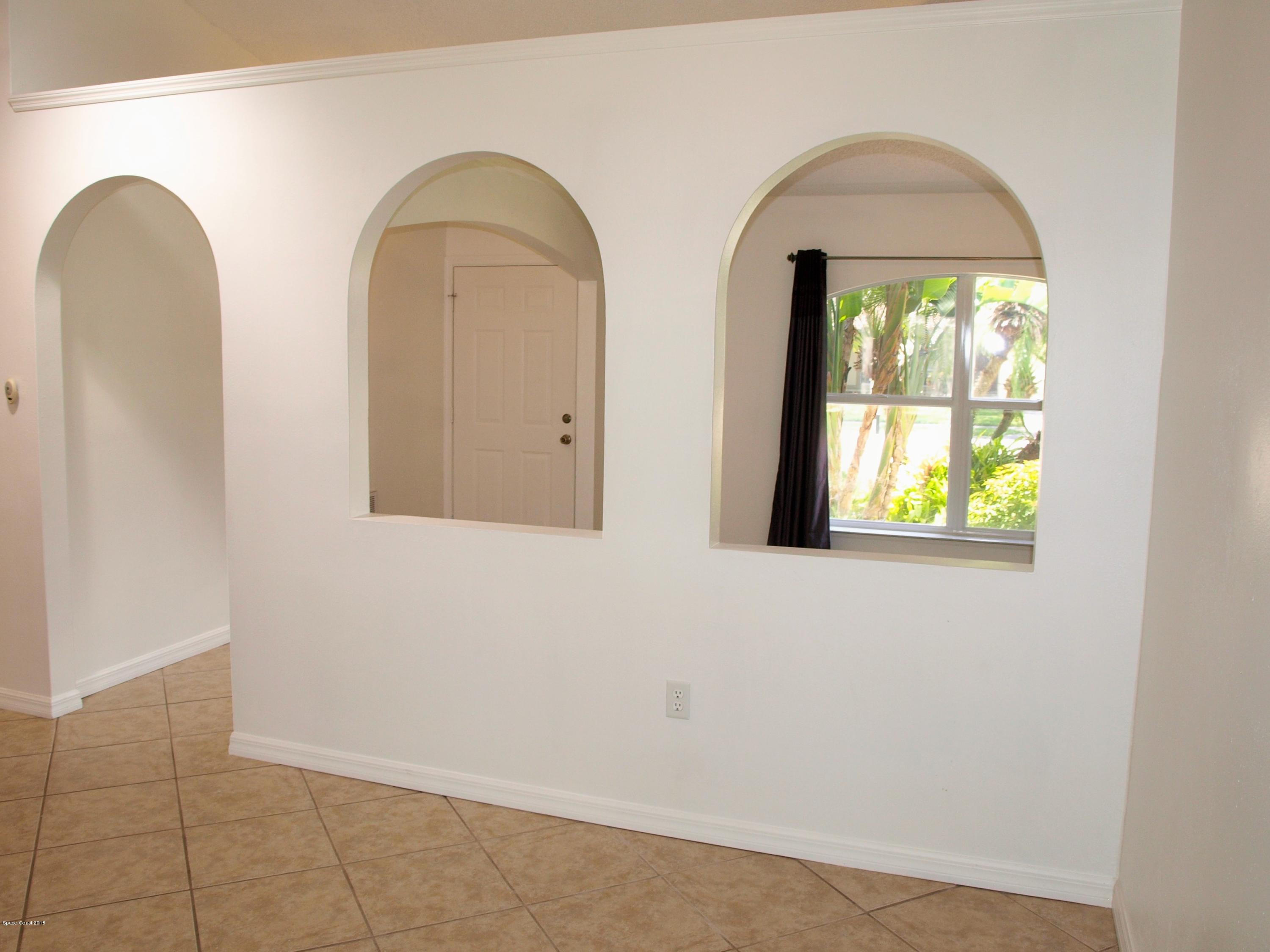 218 Twin Lakes Road Melbourne, FL 32901 - Photo 10 of 32 Dining Room Looking to Living Room