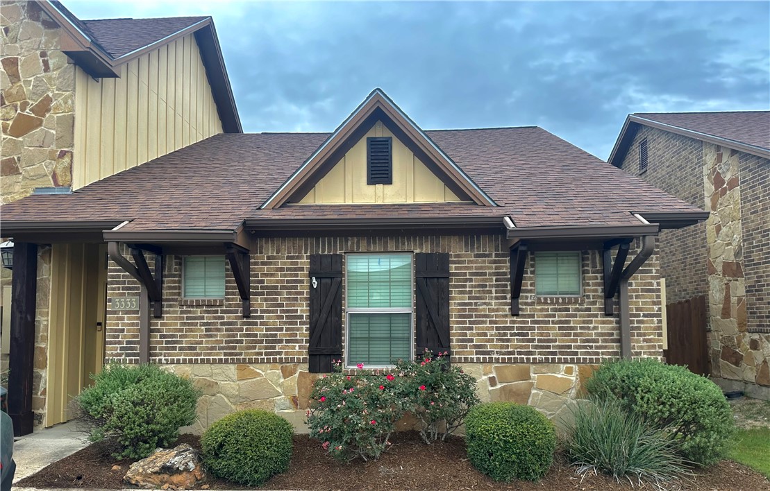 3201 Corporal Road College Station, TX 77845 - Photo 1 of 10 a view of a house with large windows and plants