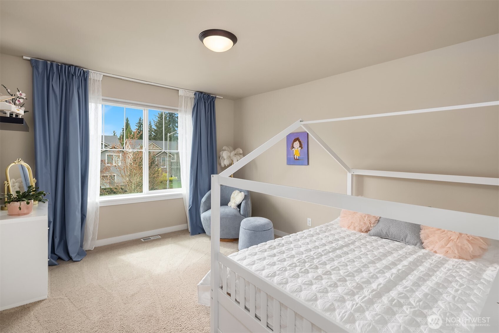 1435 242nd Place Southeast Bothell, WA 98021 - Photo 31 of 40 a bed room with a bed and a large window