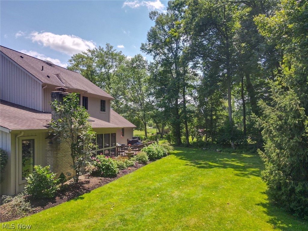 3700 Chagrin River Road Chagrin Falls, OH 44022 - Photo 35 of 43 View of yard featuring a wooden deck