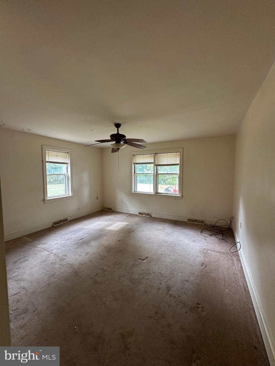 2324 Oldfield Point Road Elkton, MD 21921 - Photo 15 of 40 a view of empty room with windows