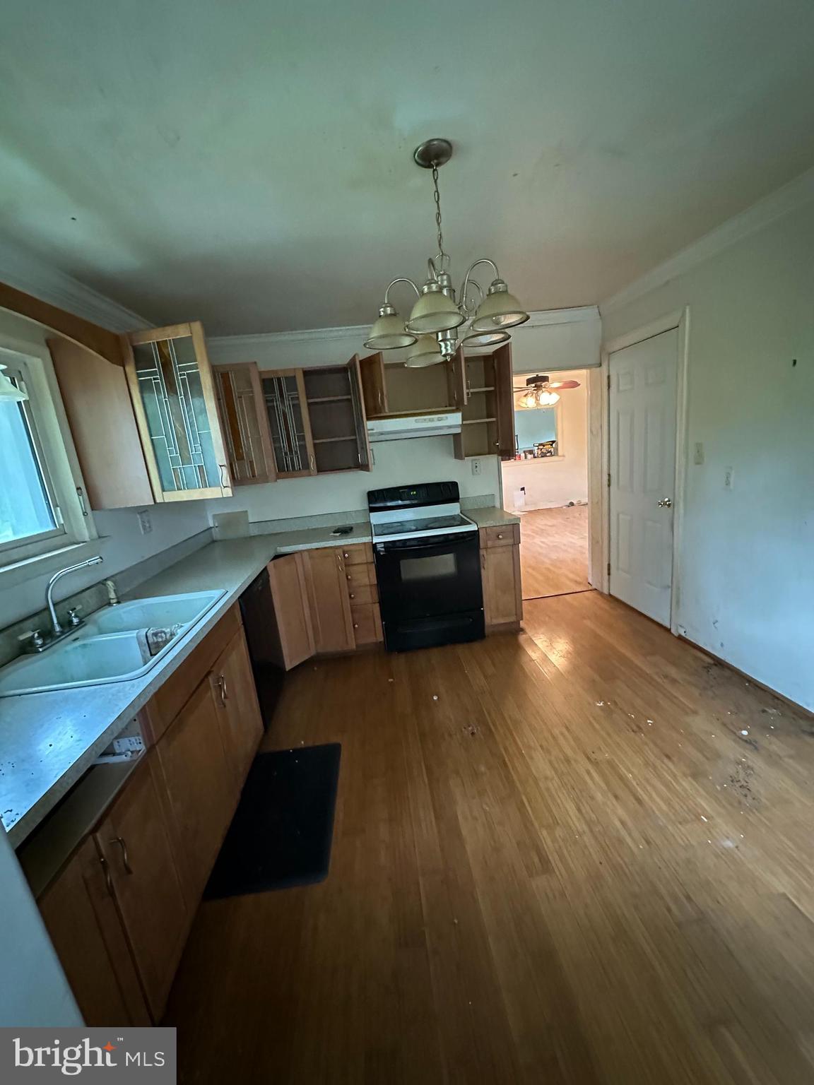 2324 Oldfield Point Road Elkton, MD 21921 - Photo 29 of 40 a kitchen with stainless steel appliances granite countertop a stove a sink and a refrigerator