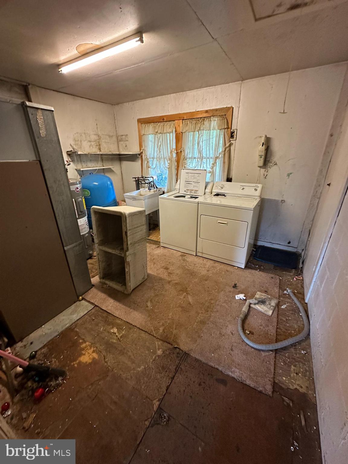 2324 Oldfield Point Road Elkton, MD 21921 - Photo 30 of 40 a bathroom with a sink toilet and shower