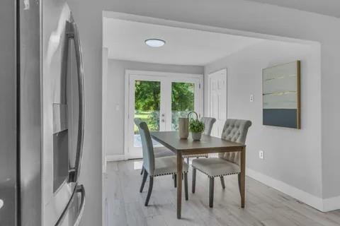 110 North Hillside Street Red Oak, TX 75154 - Photo 8 of 25 Dining room with french doors and light wood-style floors