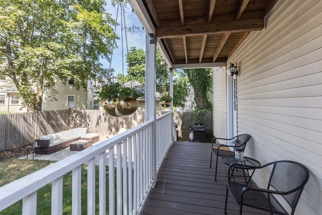 32 Skahan Road, Unit 32 Belmont, MA 02478 - Photo 17 of 18 a view of a chair and table in the balcony