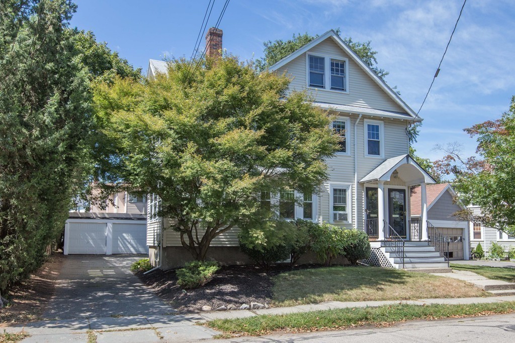 32 Skahan Road, Unit 32 Belmont, MA 02478 - Photo 18 of 18 a front view of a house with garden