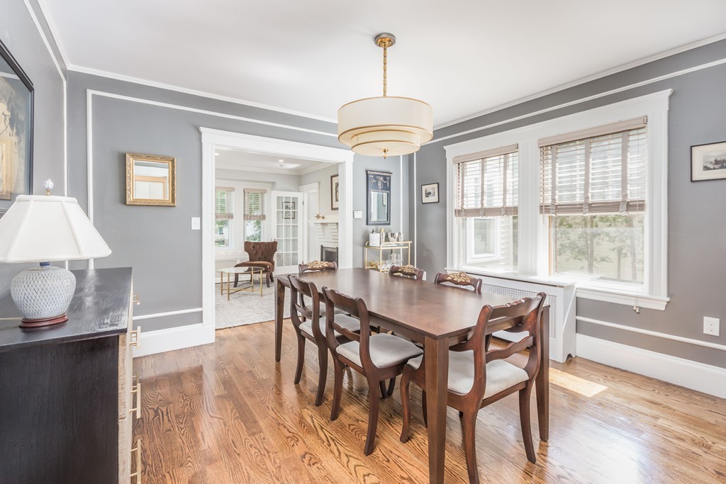 32 Skahan Road, Unit 32 Belmont, MA 02478 - Photo 5 of 18 a view of a a dining room with furniture window and wooden floor