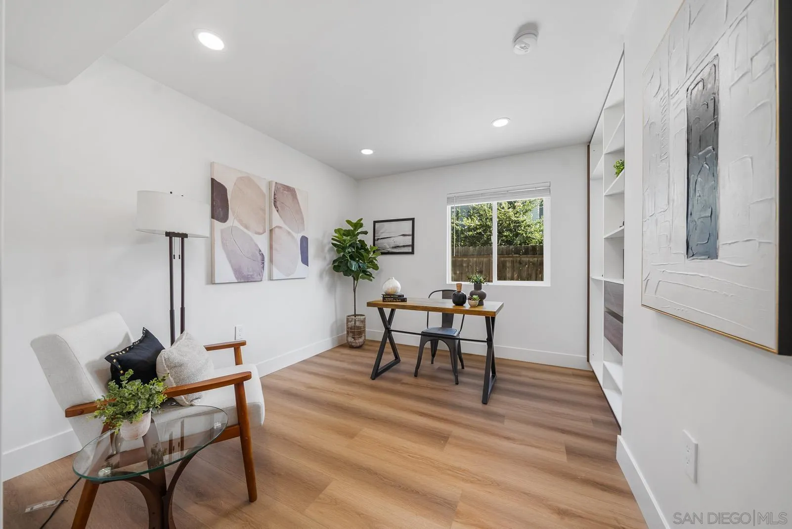 3523 Chauncey Road Oceanside, CA 92056 - Photo 16 of 34 a living room with furniture and a potted plant