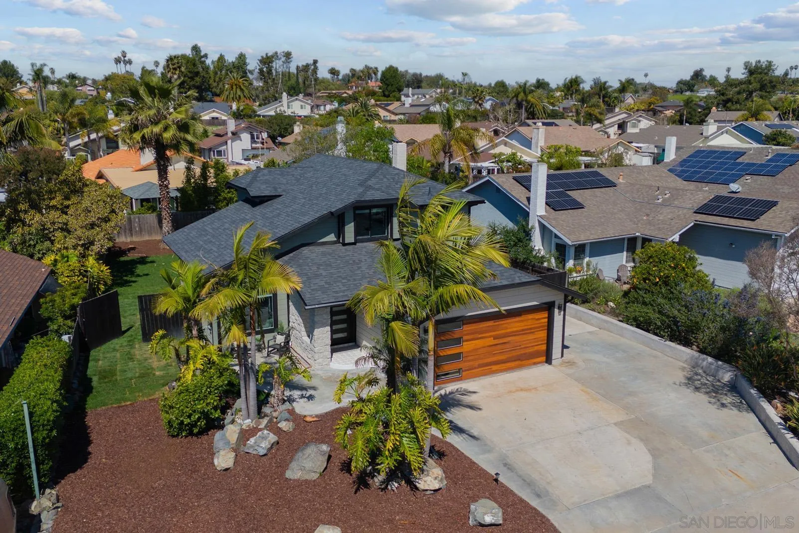 3523 Chauncey Road Oceanside, CA 92056 - Photo 2 of 34 an aerial view of multiple houses with yard