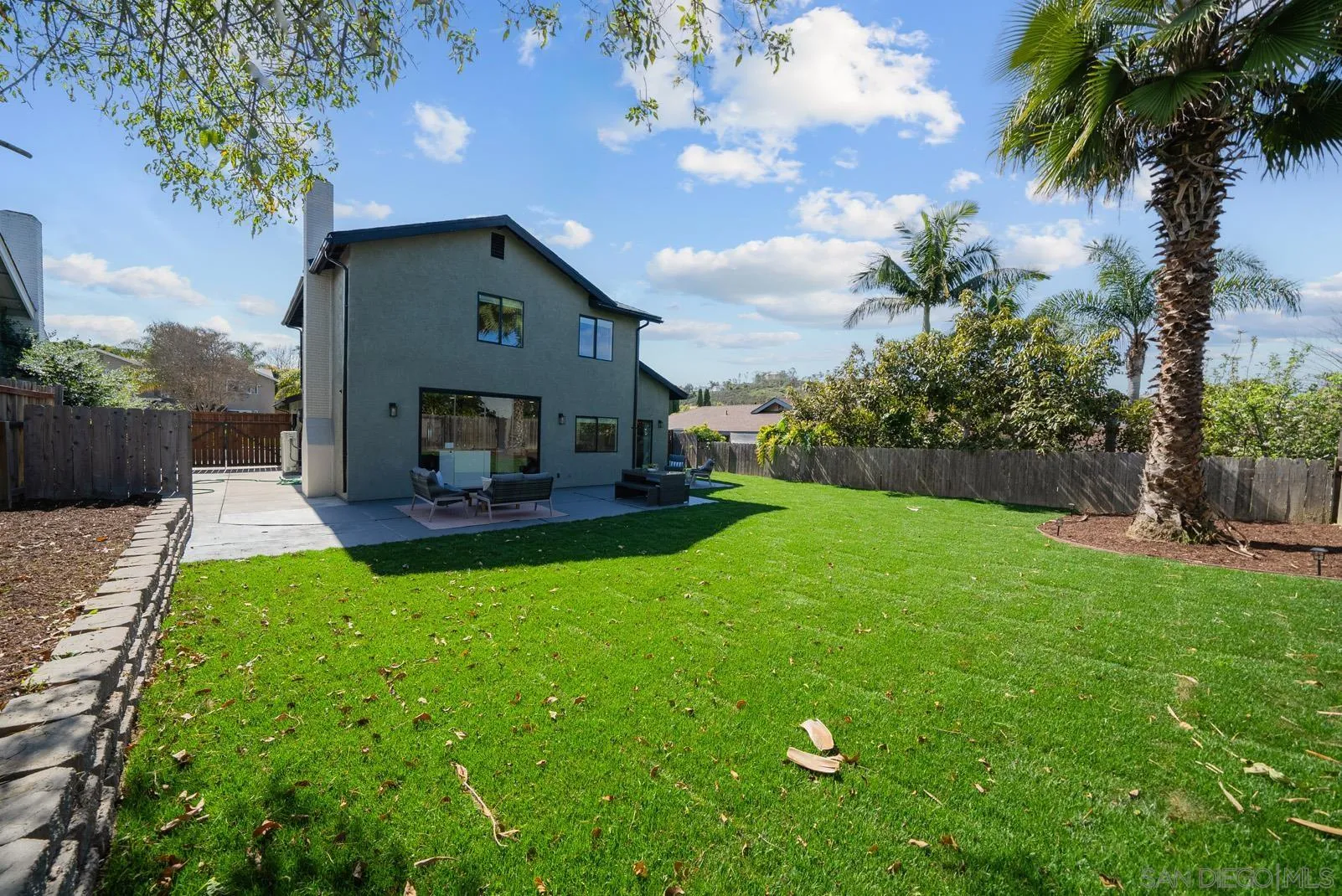 3523 Chauncey Road Oceanside, CA 92056 - Photo 29 of 34 a front view of a house with garden