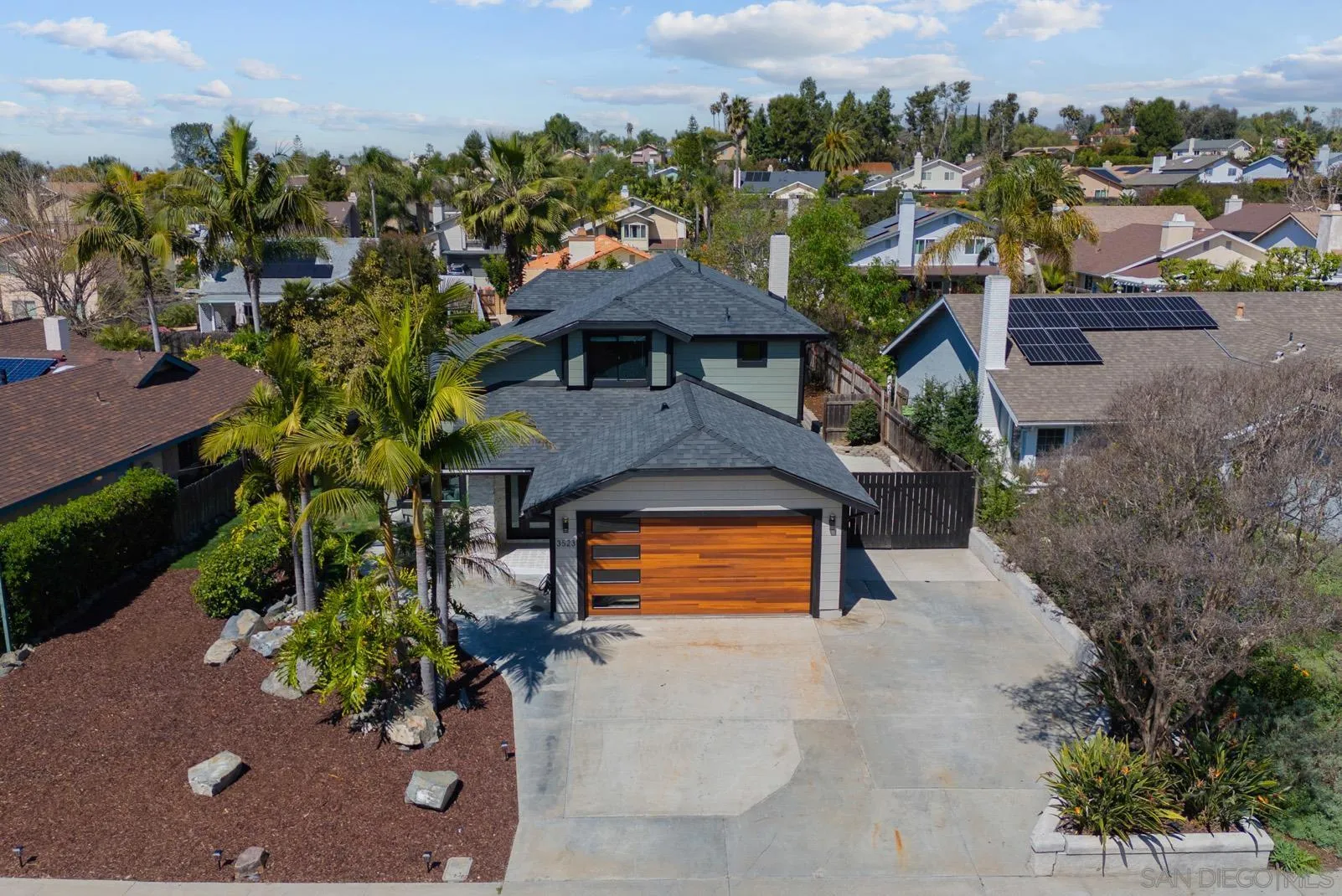 3523 Chauncey Road Oceanside, CA 92056 - Photo 3 of 34 an aerial view of a house with a yard