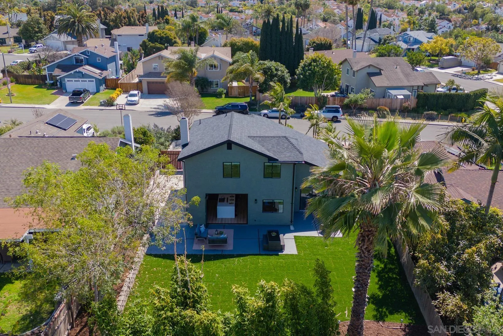 3523 Chauncey Road Oceanside, CA 92056 - Photo 33 of 34 an aerial view of a house with a garden and swimming pool