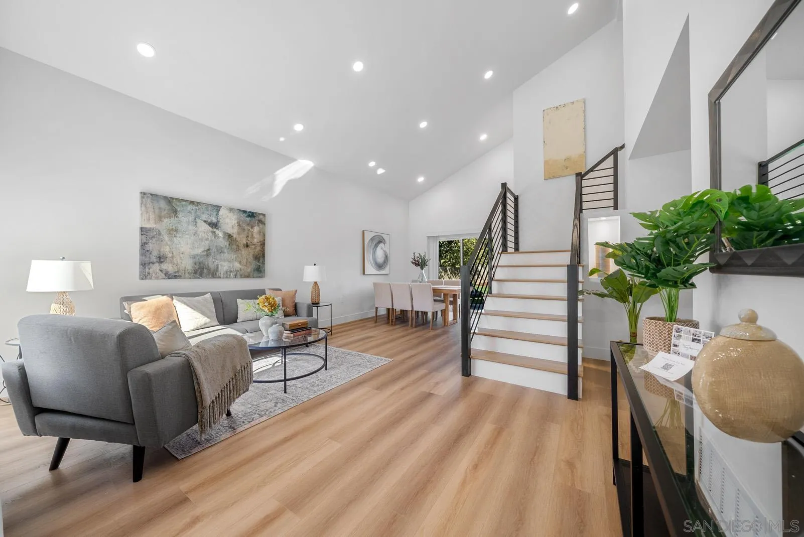3523 Chauncey Road Oceanside, CA 92056 - Photo 4 of 34 a living room with furniture and a potted plant