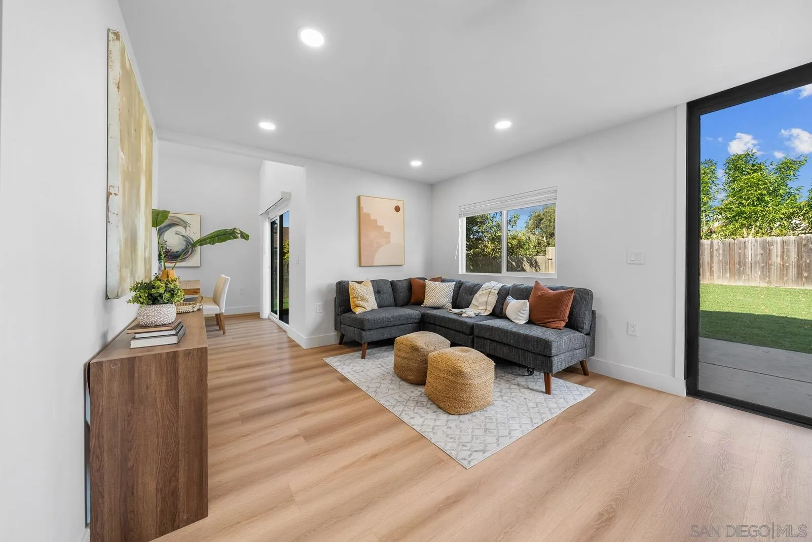 3523 Chauncey Road Oceanside, CA 92056 - Photo 10 of 34 a living room with furniture and a large window