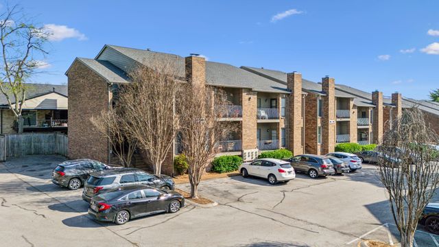 a car parked in front of a building
