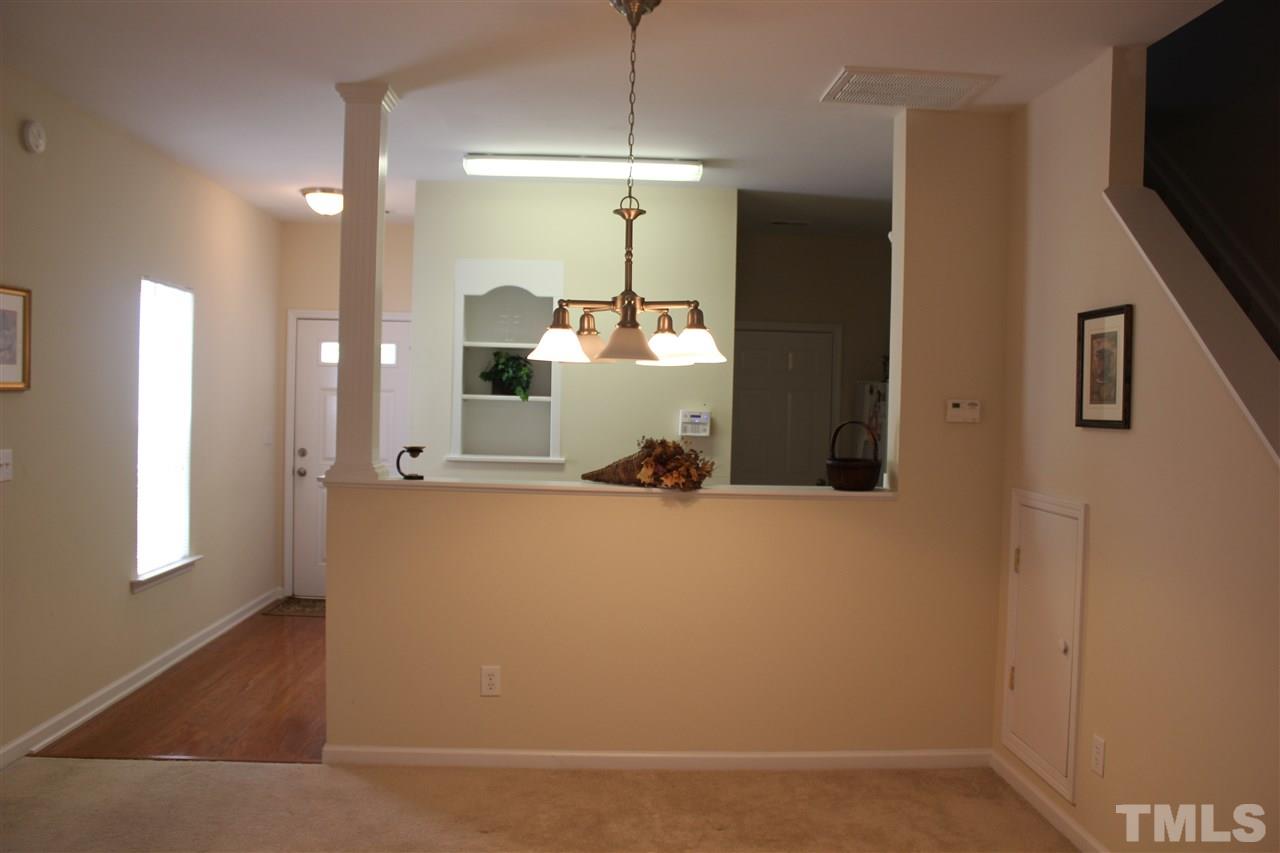 2150 Metacomet Way Raleigh, NC 27604 - Photo 5 of 24 a view of a living room with a flat screen tv