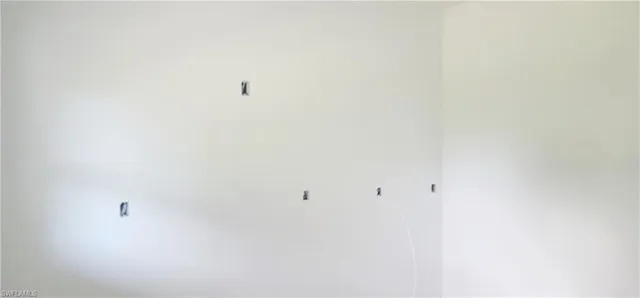 a view of a room that has a window