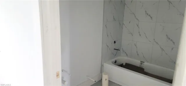 a view of an entryway with hallway