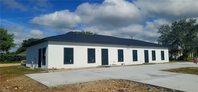 a balcony with furniture and wooden floor