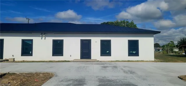 a bathroom with a shower and a shower curtain