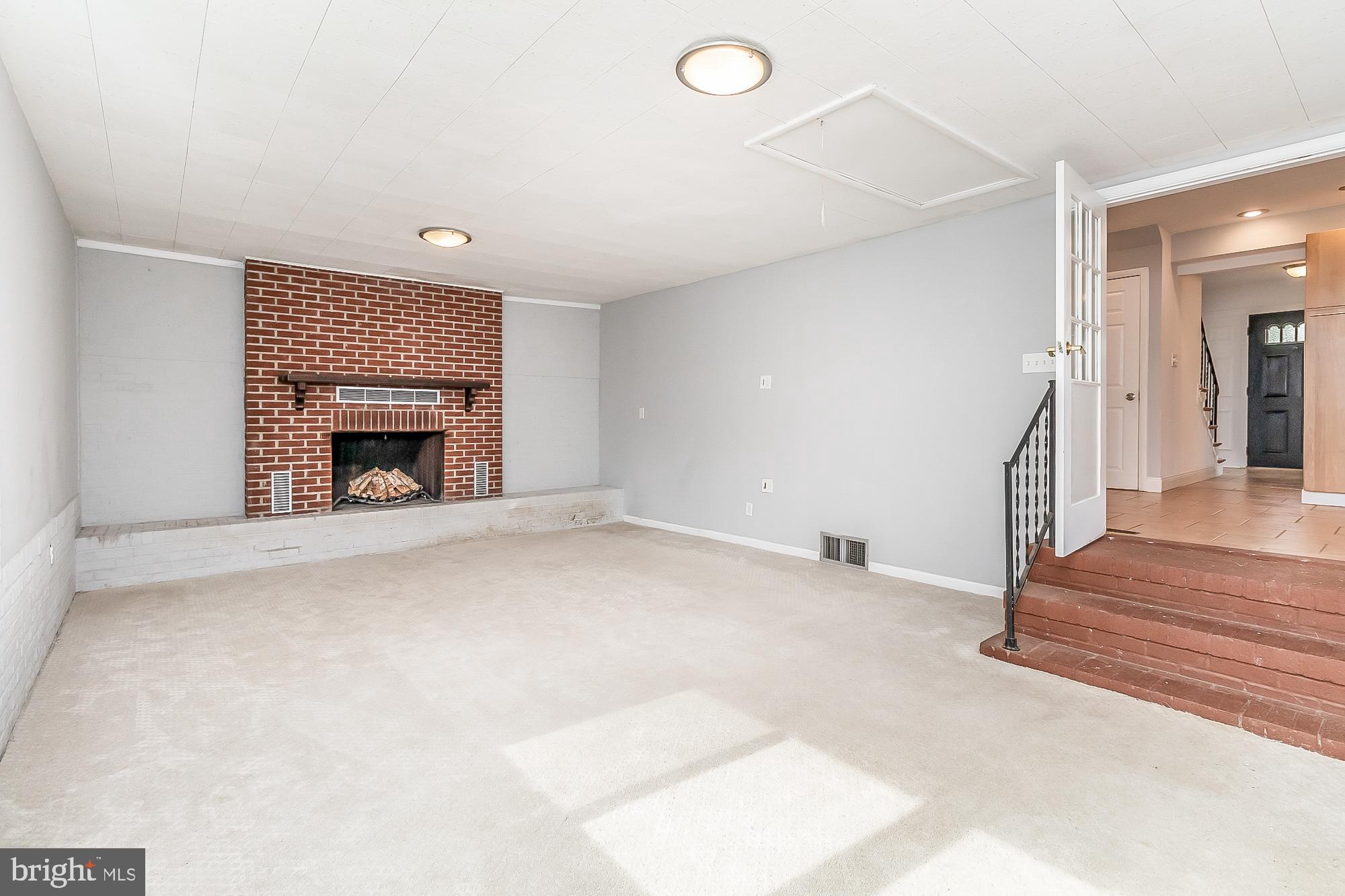 1522 National Rosedale, MD 21237 - Photo 28 of 41 Family room with wood FP overlooks pool