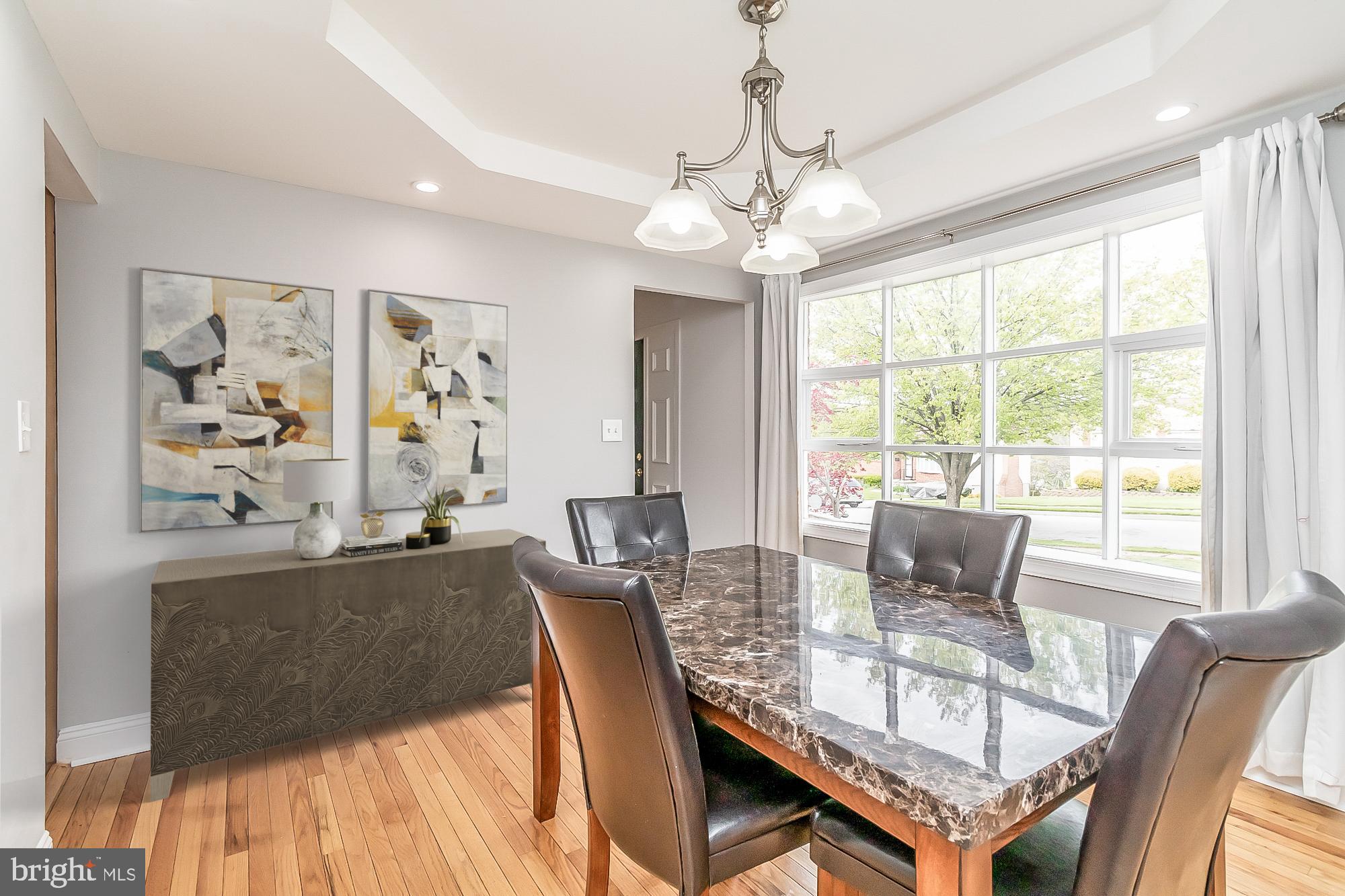 1522 National Rosedale, MD 21237 - Photo 3 of 41 DR with tray ceiling, bow window & hardwood floors