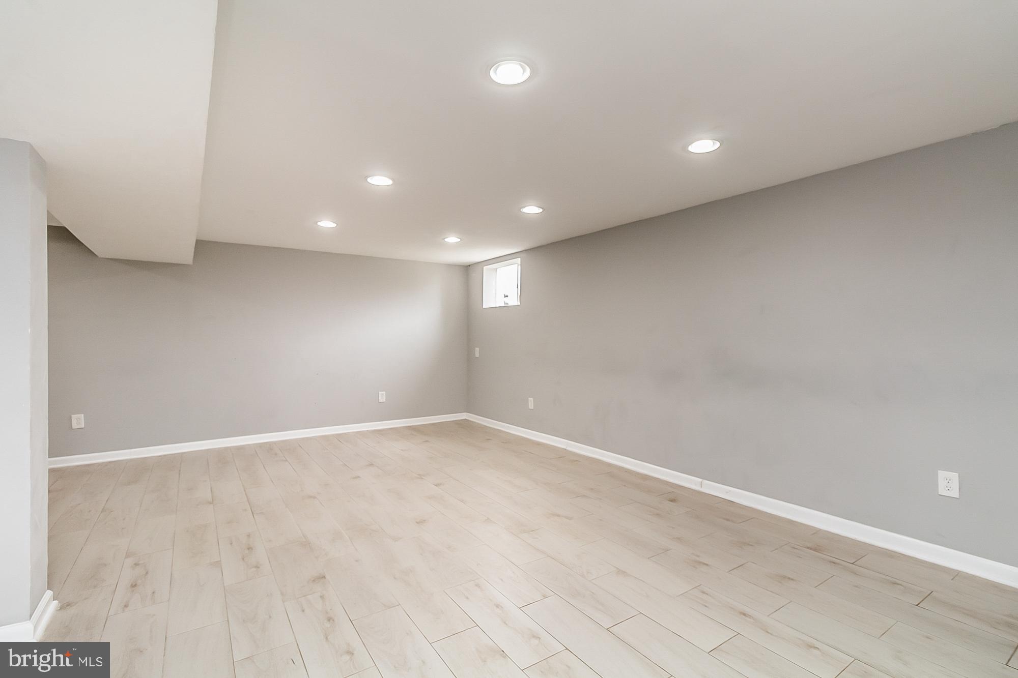1522 National Rosedale, MD 21237 - Photo 36 of 41 Rec room - recessed lighting, wood-look tile floor