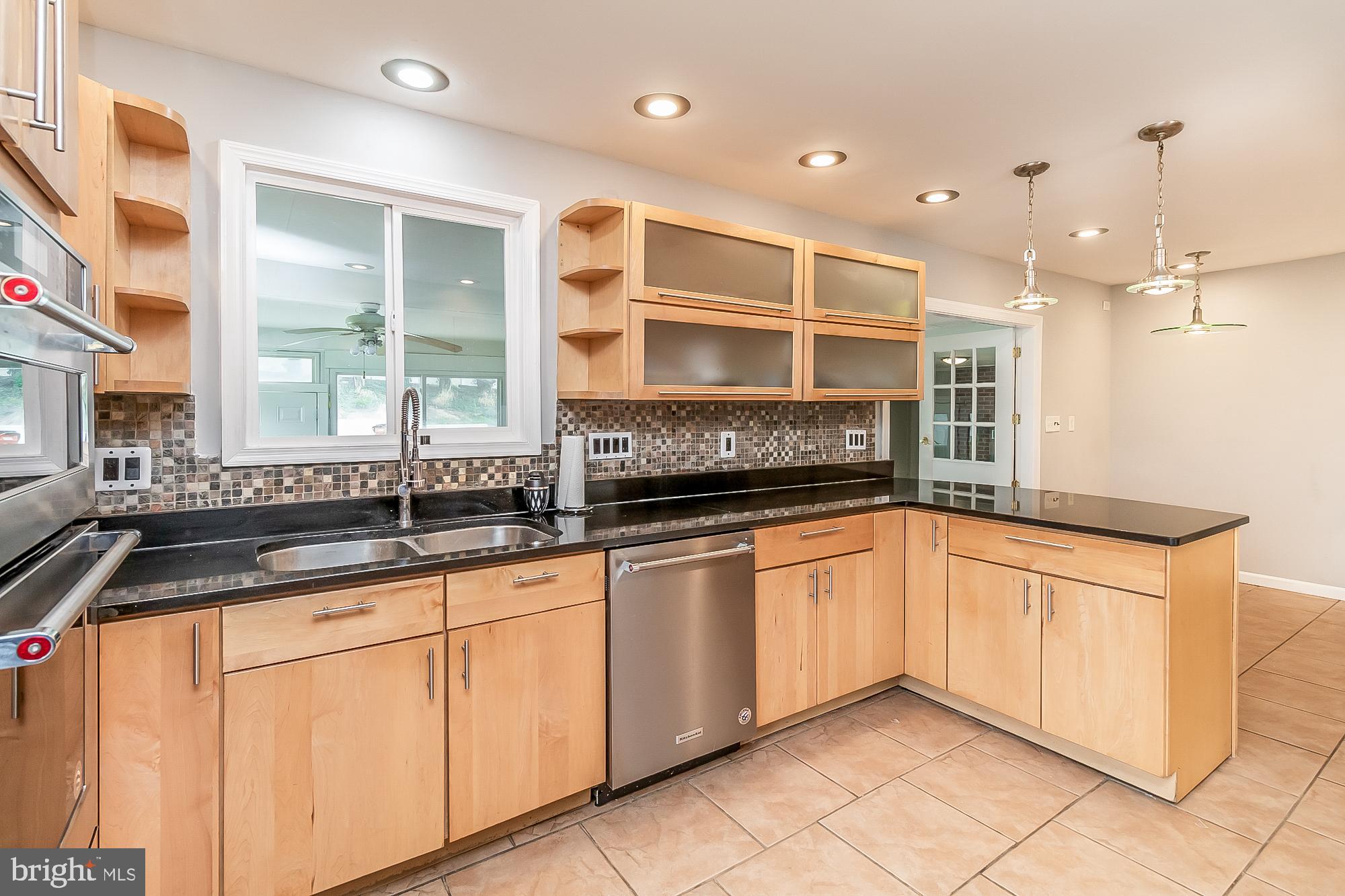 1522 National Rosedale, MD 21237 - Photo 5 of 41 Quartz counters and glass door cabinetry