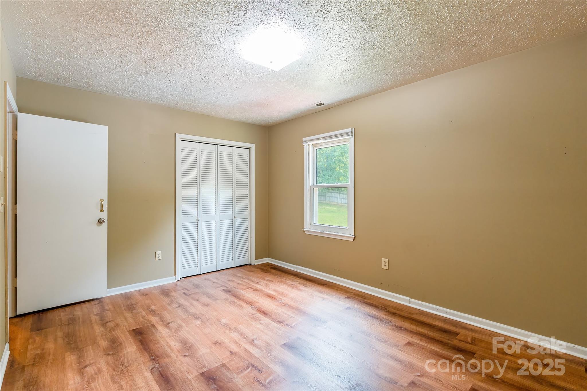 2675 Tablerock Road Lenoir, NC 28645 - Photo 11 of 31 a view of empty room with wooden floor