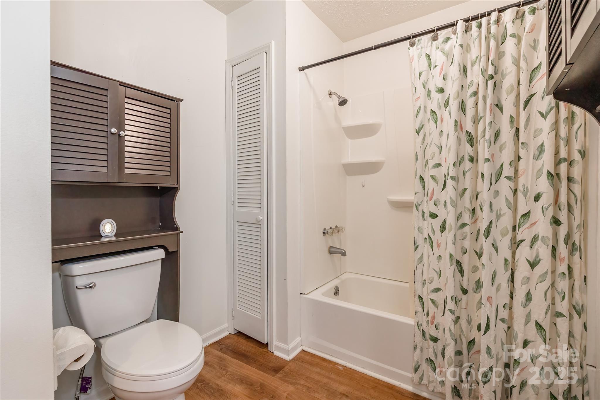 2675 Tablerock Road Lenoir, NC 28645 - Photo 17 of 31 a white toilet sitting next to a bath tub