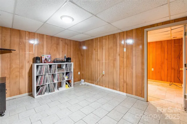 an empty room with shelves