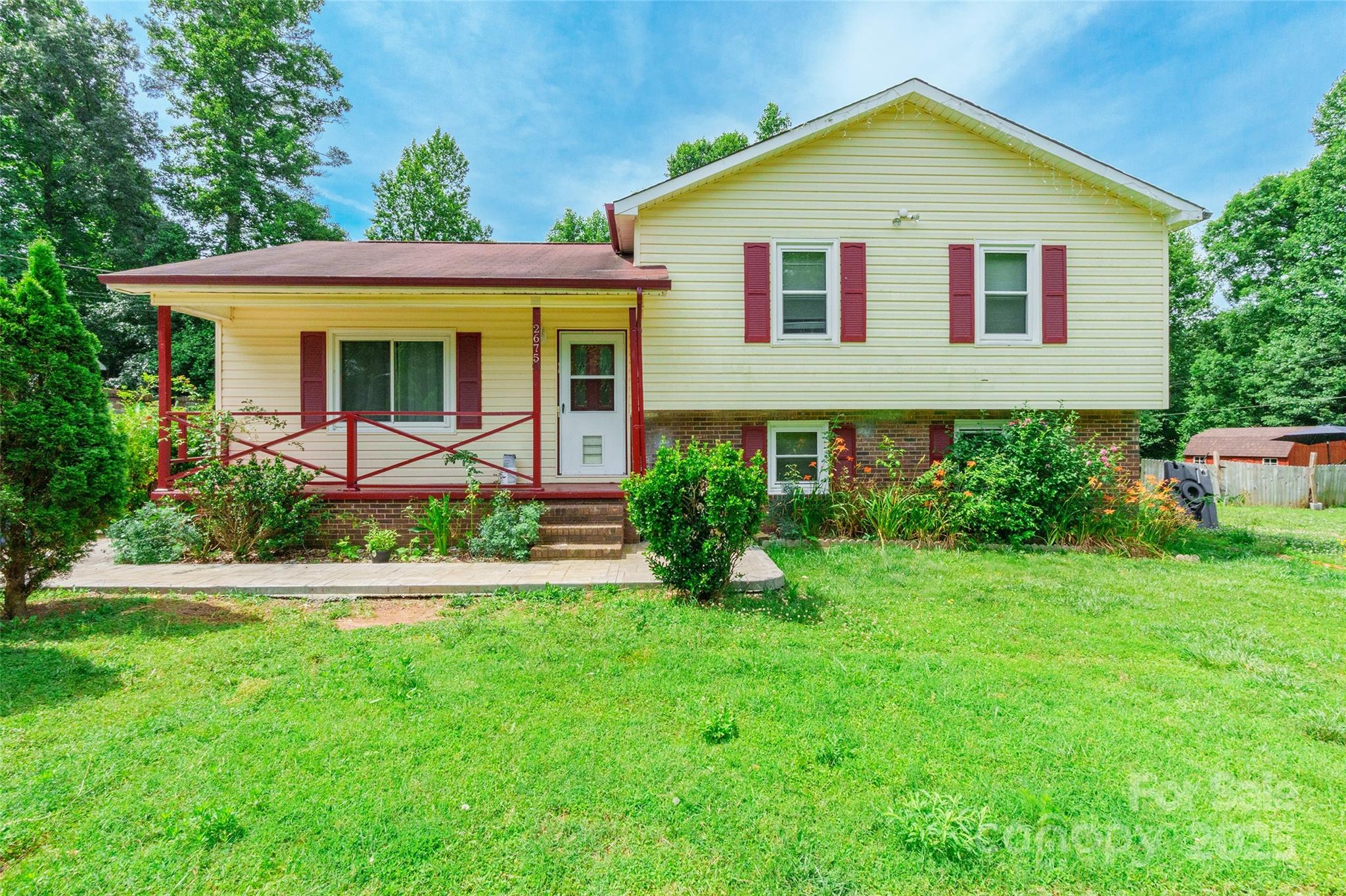 2675 Tablerock Road Lenoir, NC 28645 - Photo 2 of 31 a view of a yard in front of house