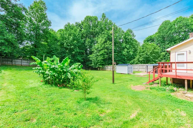 a view of a backyard with a garden