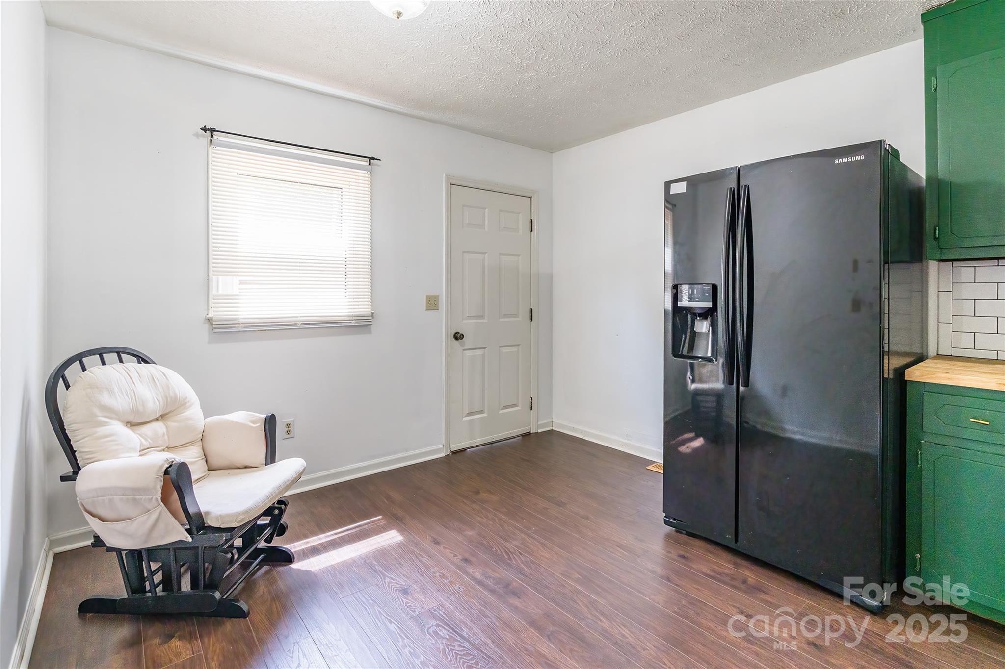 2675 Tablerock Road Lenoir, NC 28645 - Photo 9 of 31 a view of a workspace with furniture and a window