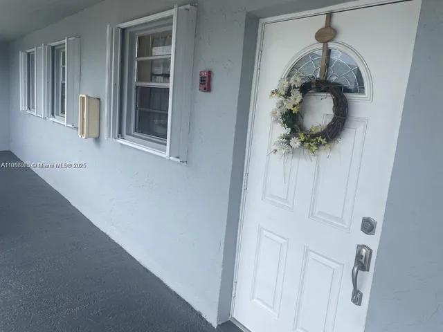 a view of a entryway and a mirror